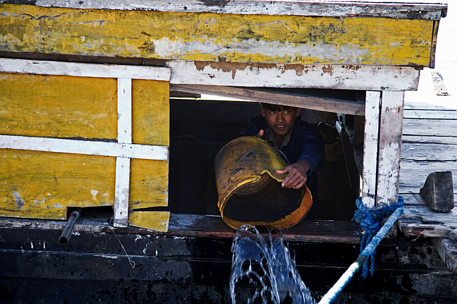 Bailing a boat on the Siang river